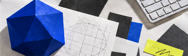 Illustrative collage of a blue geometric form, paper plans, and a keyboard